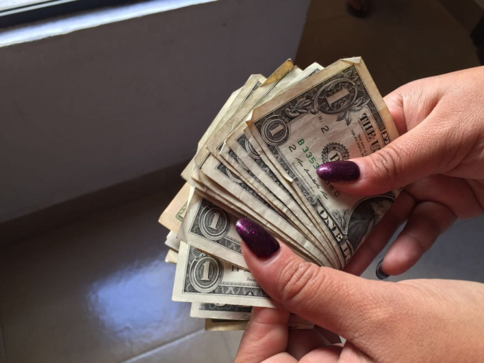 Dólar en el AICM  en 18.75 pesos a la venta