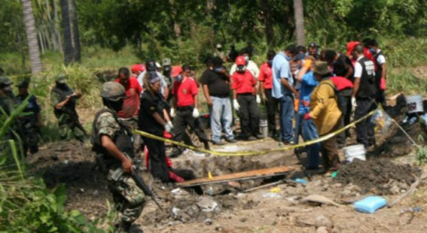 Identifican en fosa restos de 56 personas