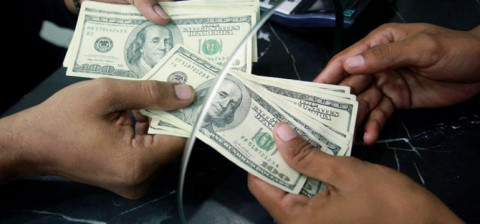 Dólar promedia 20.19 pesos a la venta en AICM