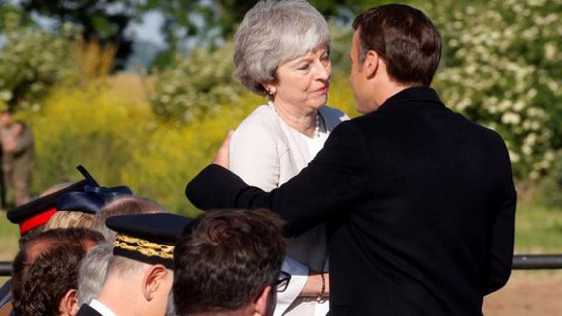 May y Macron rinden homenaje al "valor" de los veteranos del Dia-D 