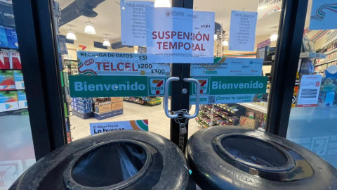 Suspenden actividades de negocios por tirar grasa y basura