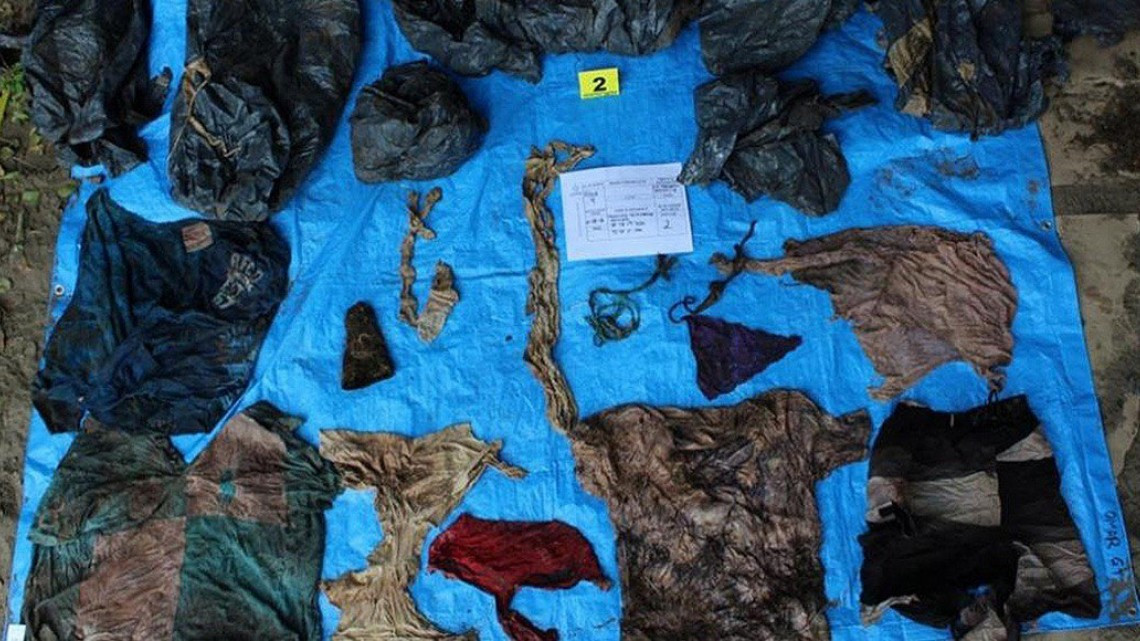 Encuentran ropa de bebé en las fosas clandestinas de Veracruz